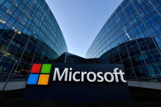 Microsoft briefly tops Apple as most valuable company