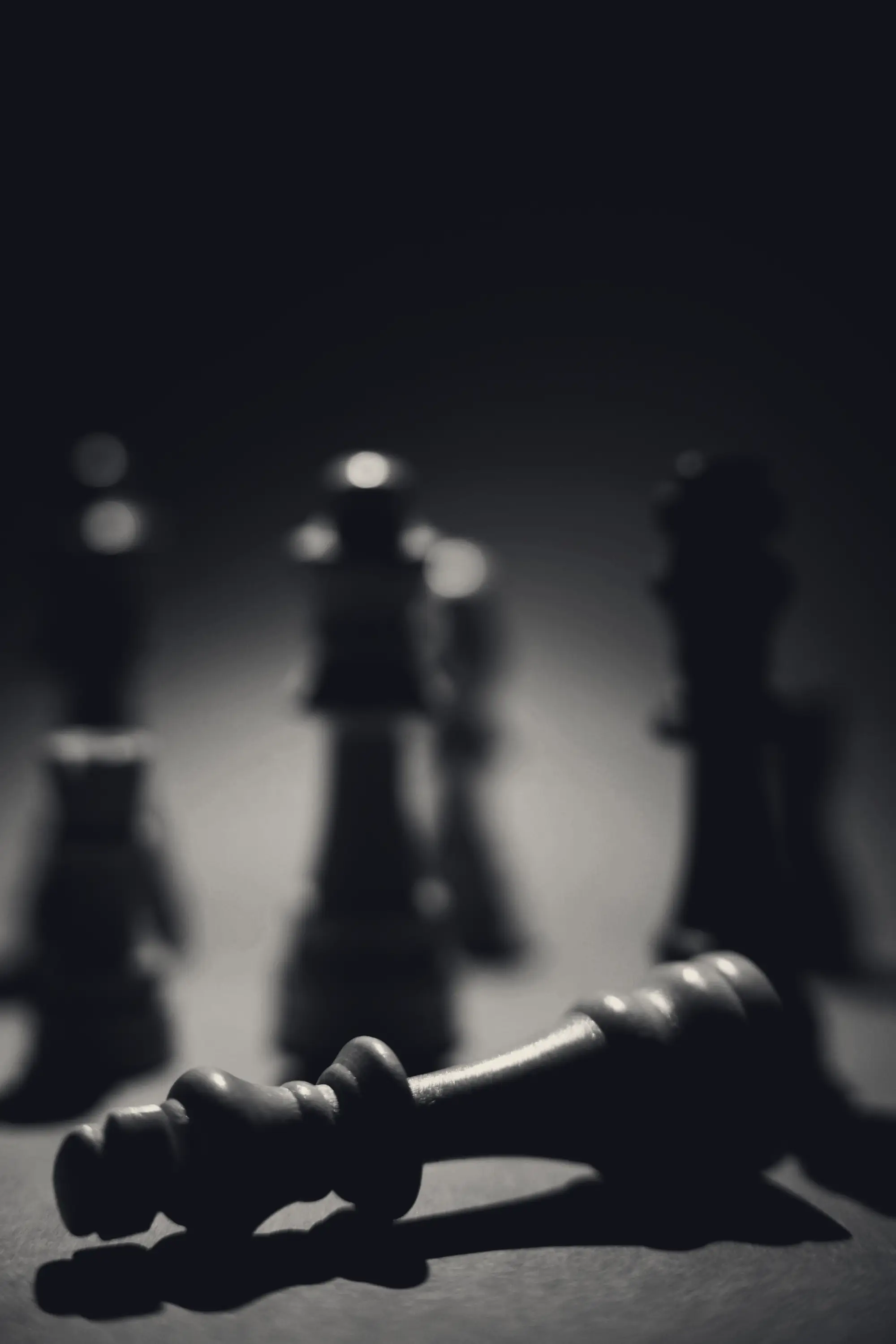 Chess pieces in low light