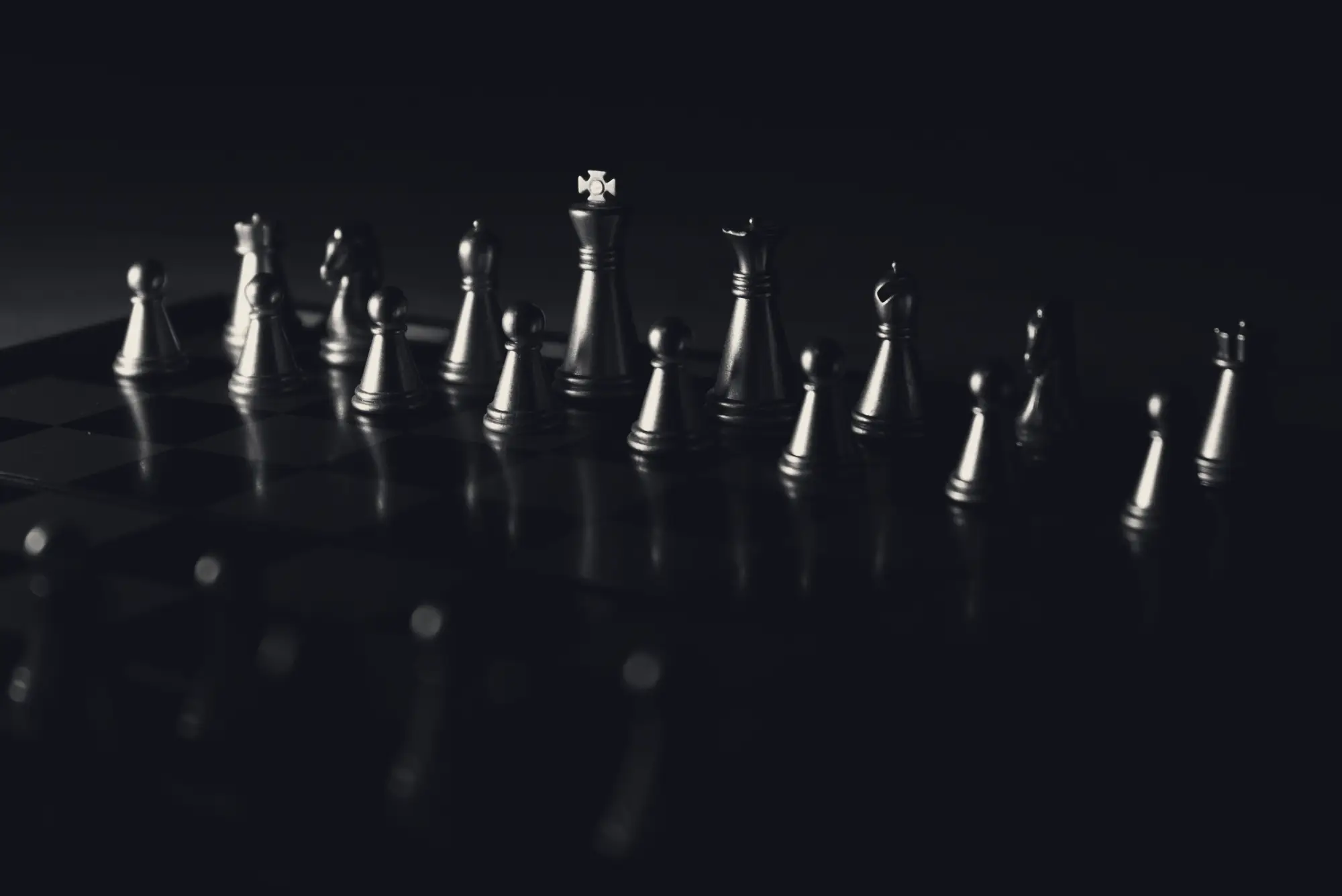 A chess board under strategic light