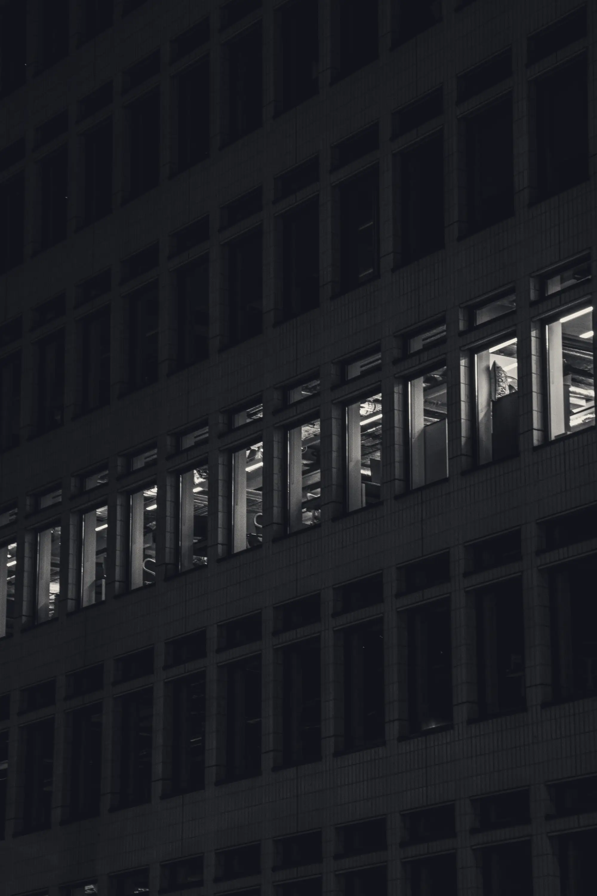 Office facade lit at night