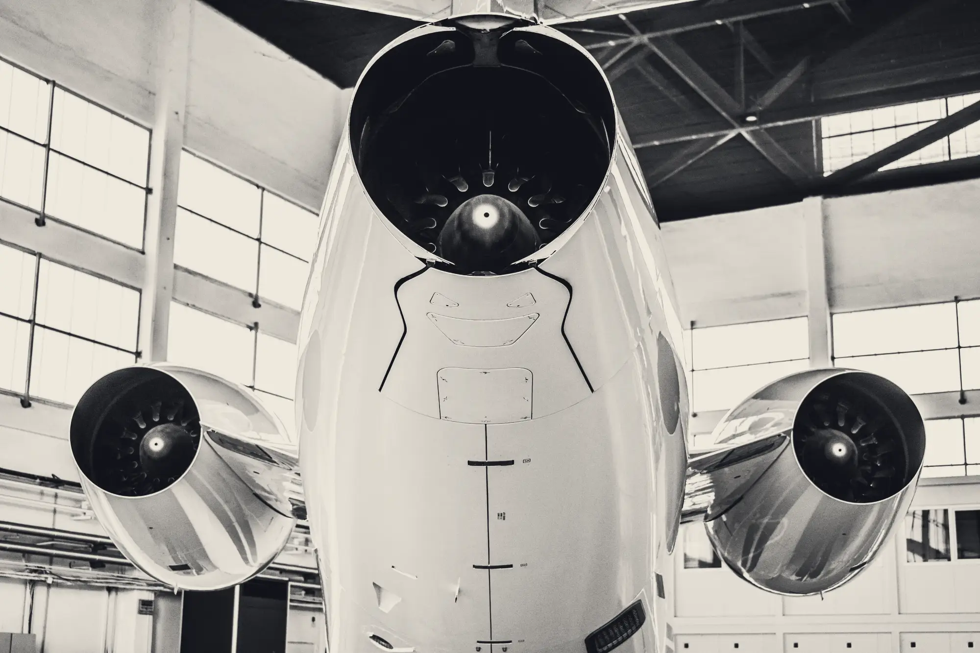 Jet engines of an aircraft inside a hangar