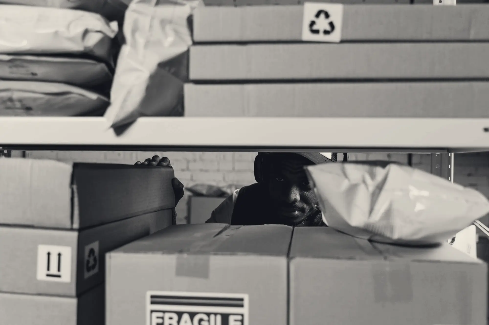 Parcels stacked in a fulfilment warehouse
